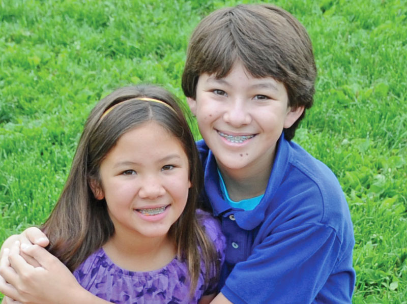 Young boy and girls with braces.